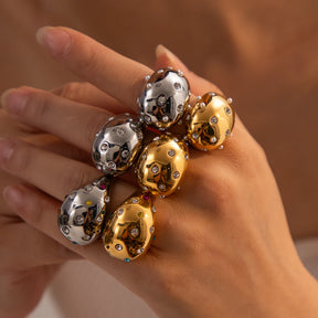 Metal rings with pearls