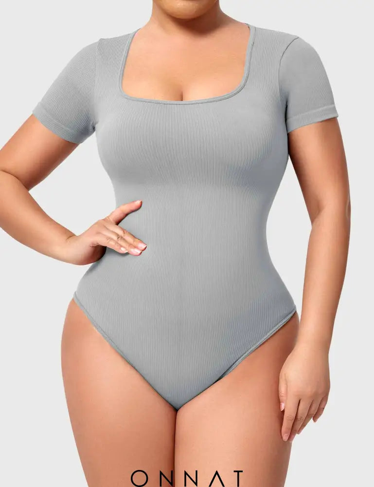 Onnat Seamless Rubi One Piece Workout Bodysuit Light Grey / S Jumpsuits